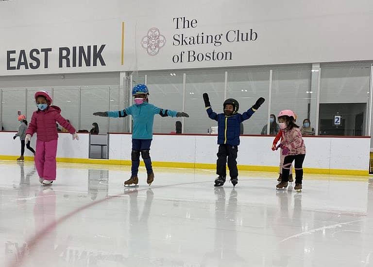 Children skating on a skating club rink